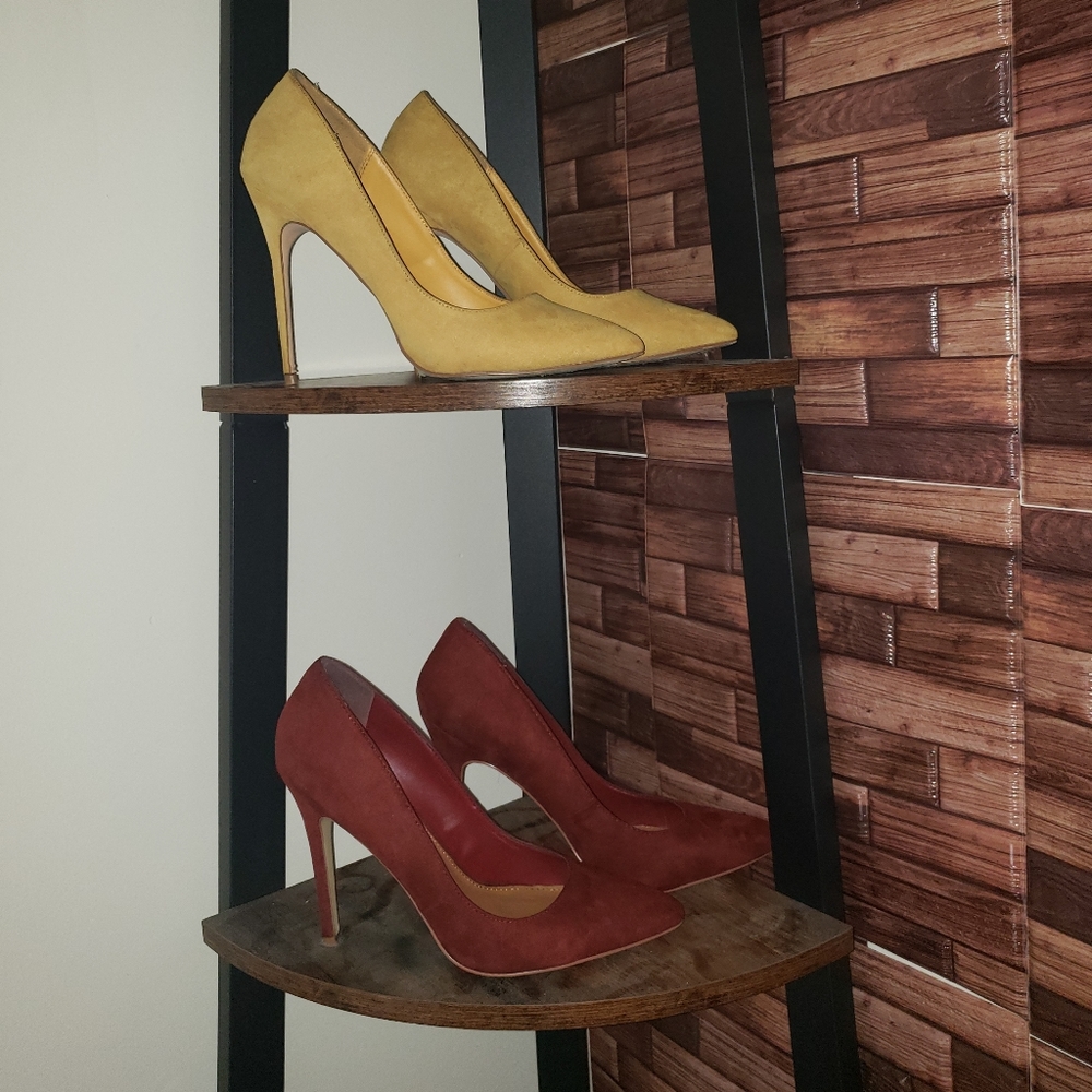 SOLD.    2 pair of high heel pumps sold together.
